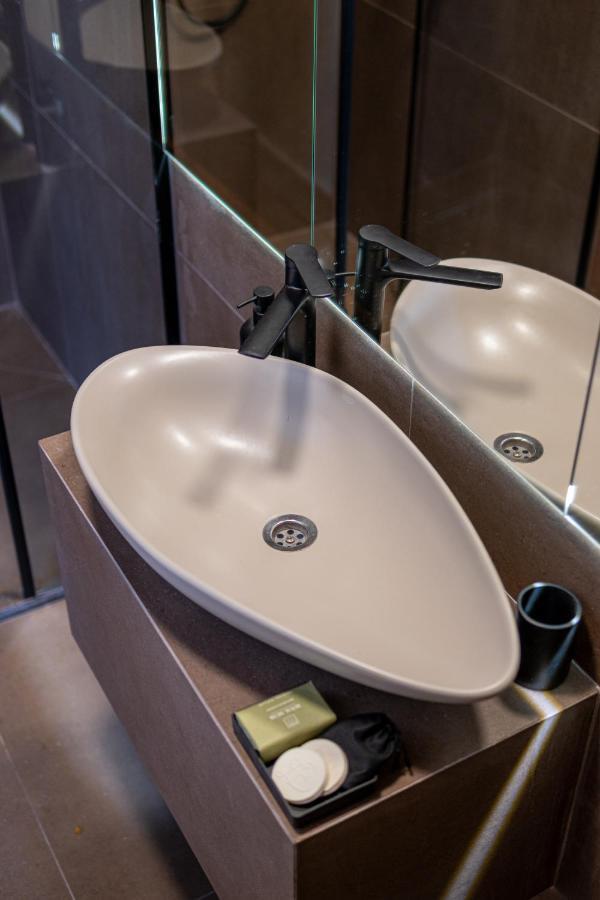 Bloom Suites Prishtine Bagian luar foto